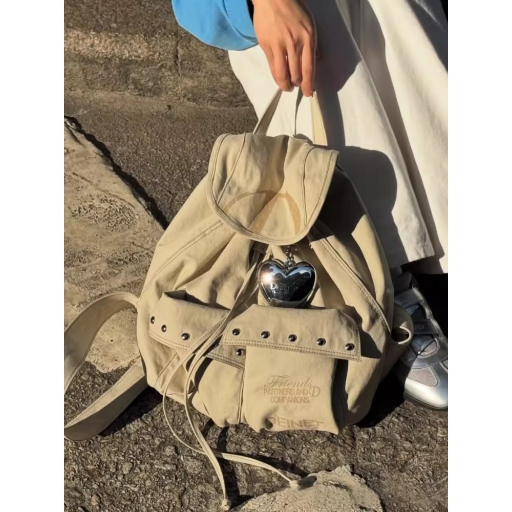 กระเป๋าเป้สะพายหลังดีไซน์เกาหลี Deinet สำหรับผู้หญิง แบบใหม่ มีสายรัด.Drawstring และ Rivet