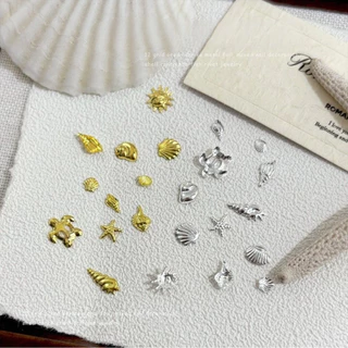 ฤดูร้อน Ocean Theme สติกเกอร์เล็บเปลือกปลาดาว Moon Charms ทองเงิน 12 กริด DIY ตกแต่งเล็บ KOULDAN