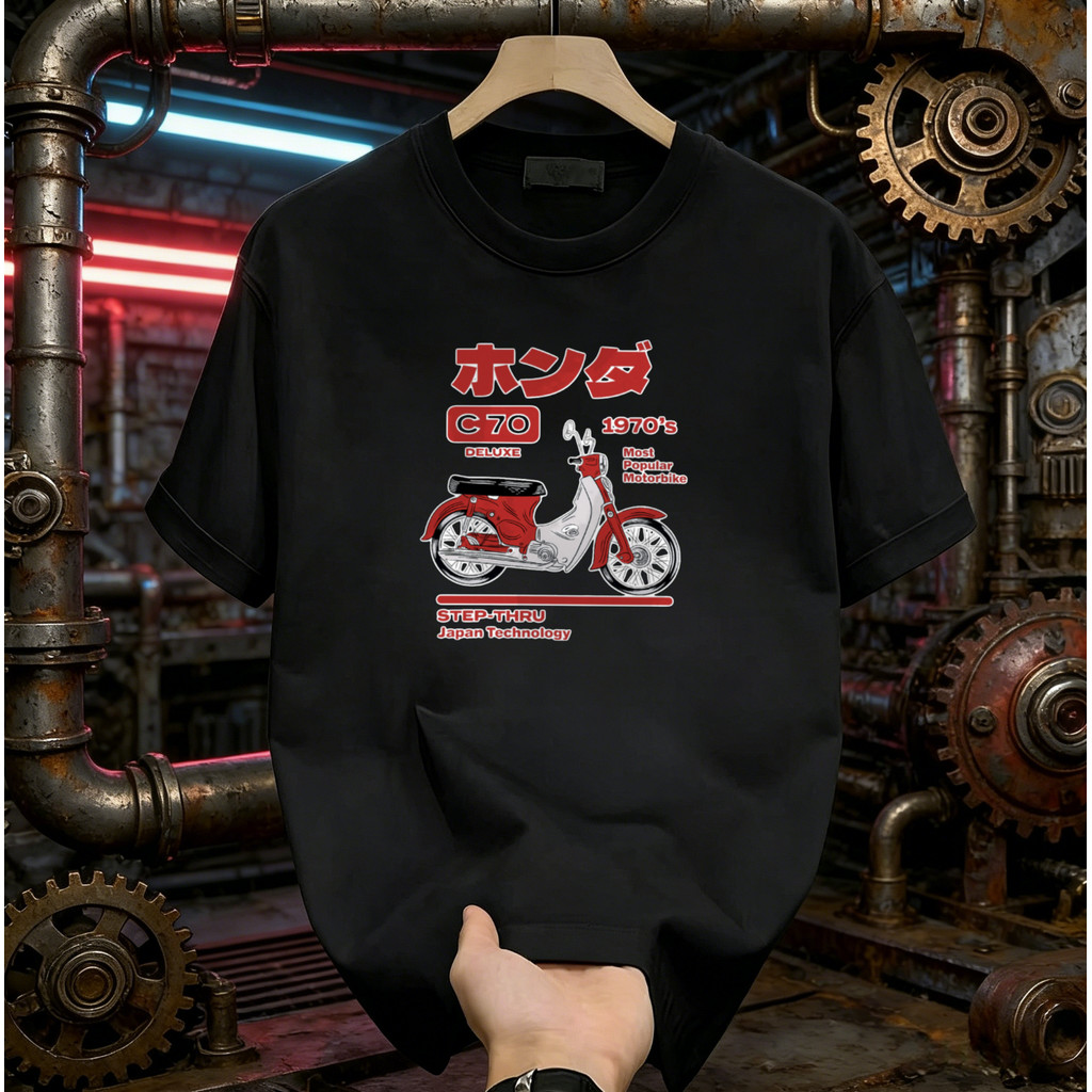เสื้อยืดแขนสั้นมีภาพประกอบHonda C70 ปี 1970 สไตล์ญี่ปุ่น พร้อมการจัดส่งภายใน 24 ชั่วโมง