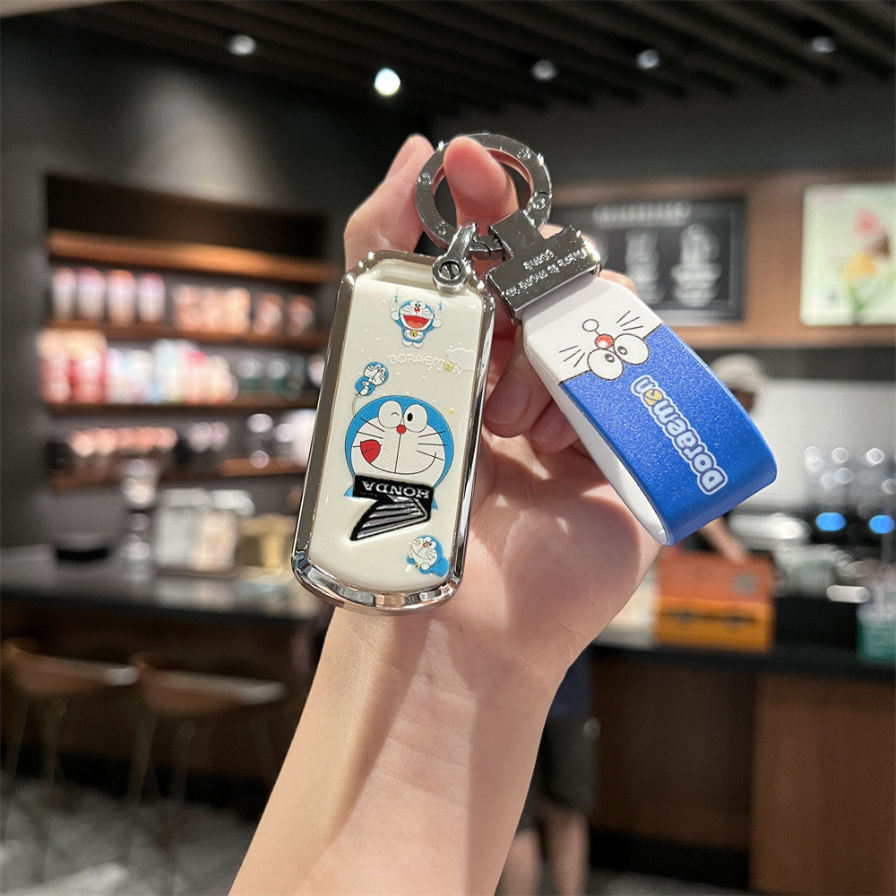 เหมาะสําหรับ Honda Fosha 350 ฝาครอบกุญแจรถจักรยานยนต์ Cracking 125 ใหม่ทวีป ns หัวเข็มขัด Haojue uhr