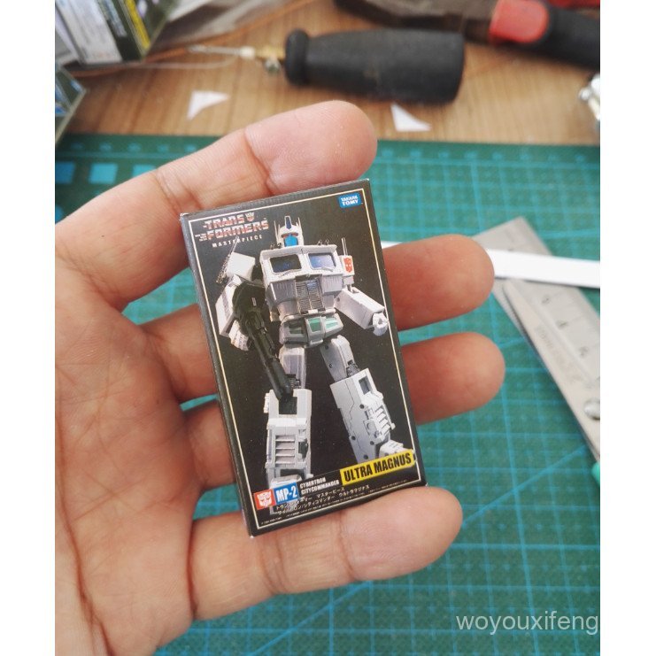 กล่องกระดาษขนาดเล็ก Transformers MP02 Tongtianxiaori พิมพ์ซ้ํา 1/6 กระดาษห่อด้านนอกรุ่นฉากโรงละคร ZW