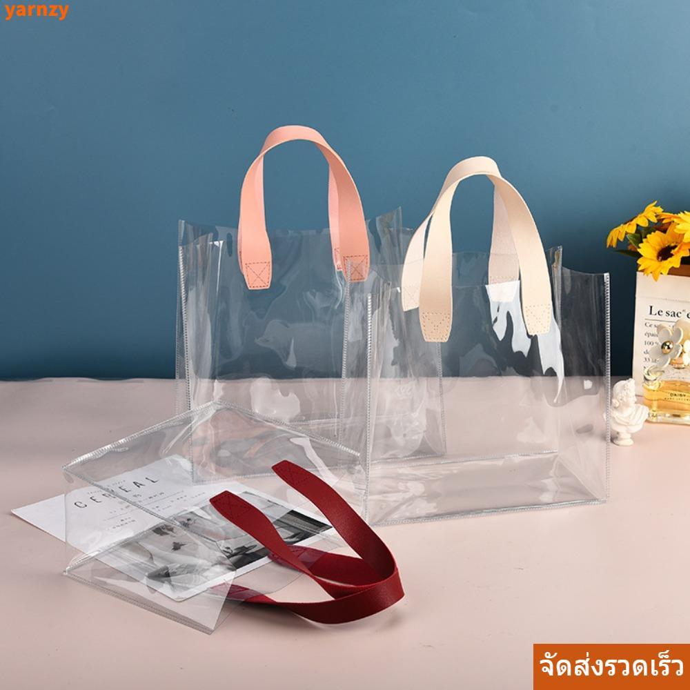 จัดส่งรวดเร็ว! กระเป๋าช้อปปิ้งและโท้ต YARNZY แบบใส กันน้ําด้วย PVC หูหิ้วง่าย