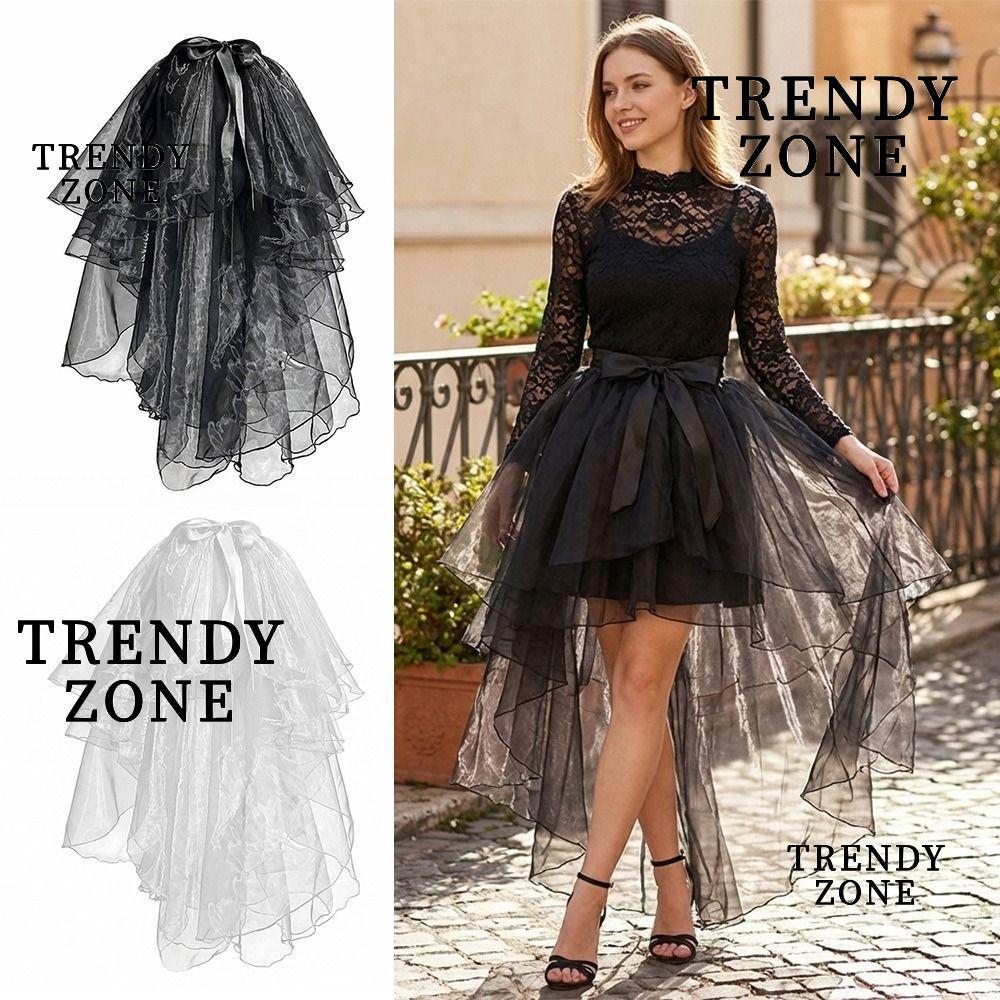 กระโปรงตาข่ายลายลูกไม้แบบเอวสูงพร้อมเชือกผูก และขอบกระโปรงที่ไม่สมมาตร มีความสวยงามและสง่างาม เหมาะสำหรับโอกาสพิเศษหรืองานแต่งกายที่ดูเรียบร้อย