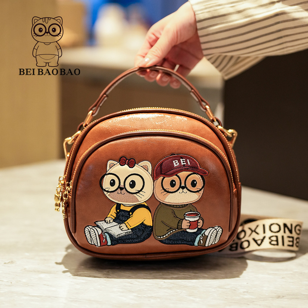 [Bei Baobao] สไตล์ใหม่แมวน่ารัก Messenger Bag-Niche Design หญิงแฟชั่นพร็อพกระเป๋าสะพาย Messenger