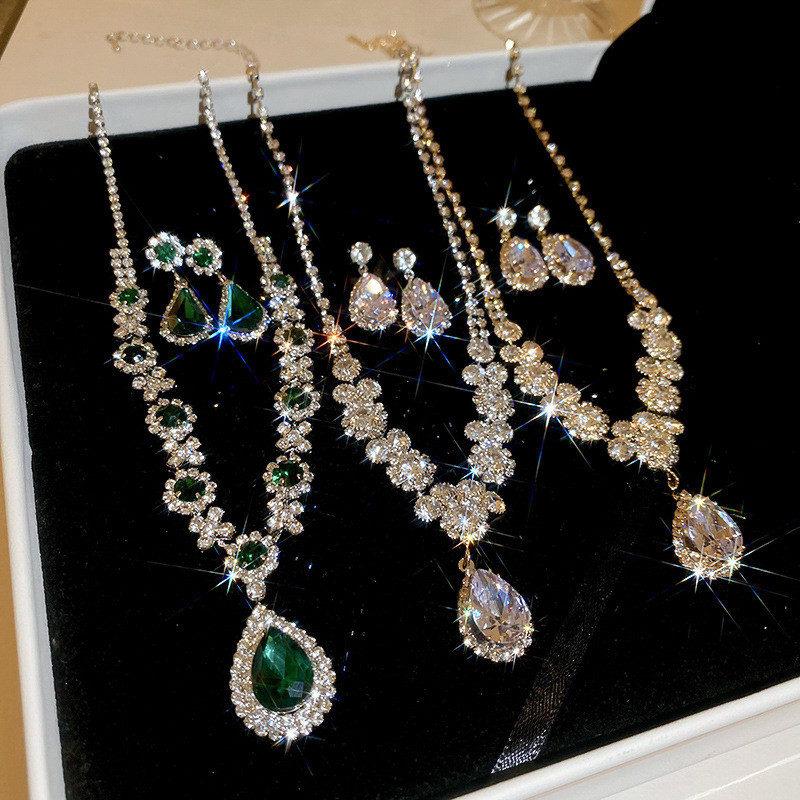 ฝังสร้อยคอต่างหูสไตล์สตั๊ดเพชรรู้สึก 2 แสง ee-30 High-End Niche Zircon หรูหราหญิงหินบุคลิกภาพชุดชิ้น