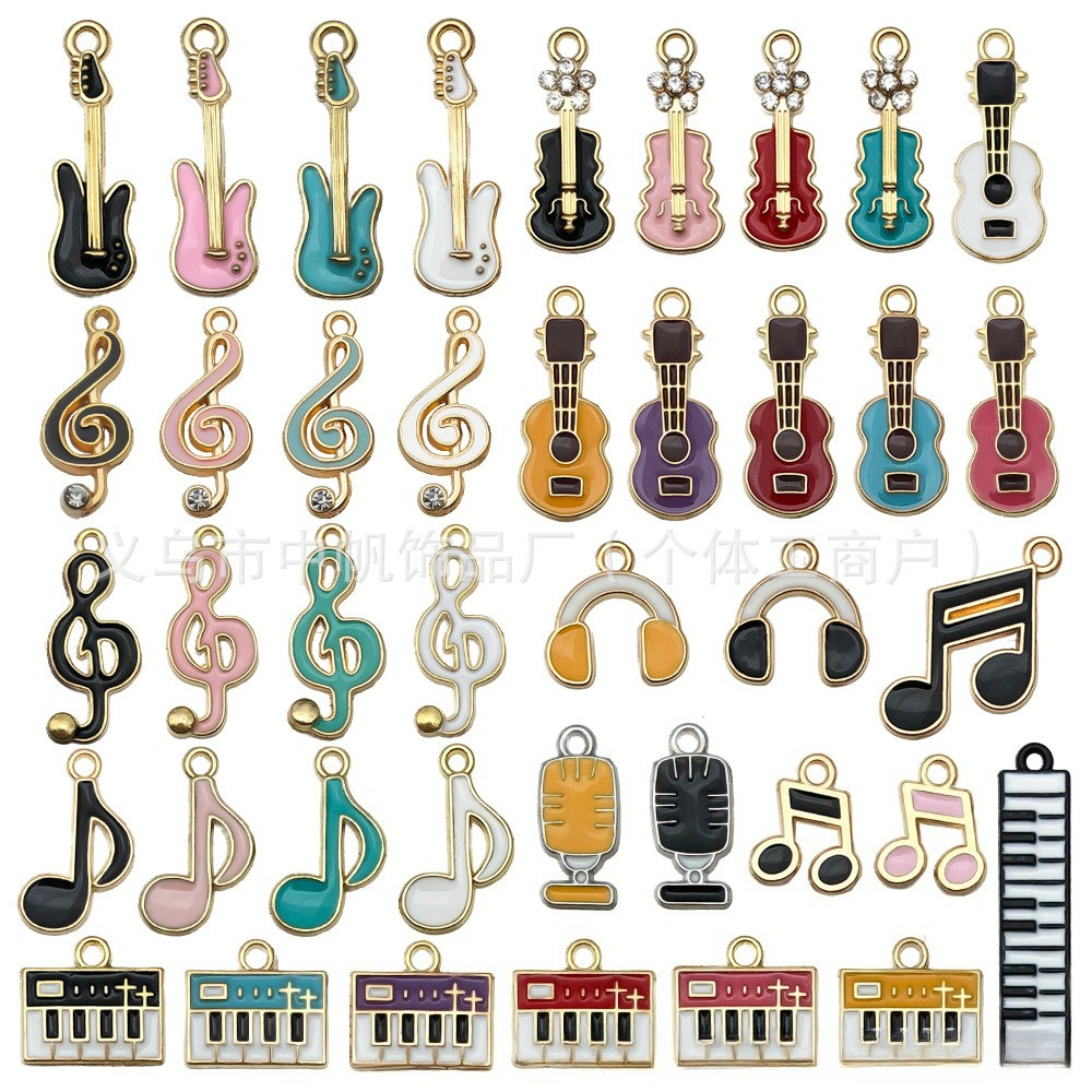แฟชั่นสร้างสรรค์โลหะผสมจี้ผสม 50 ชิ้นที่มีสีสันเครื่องดนตรีกีตาร์ไวโอลินเปียโนหมายเหตุเคลือบ DIY Charms