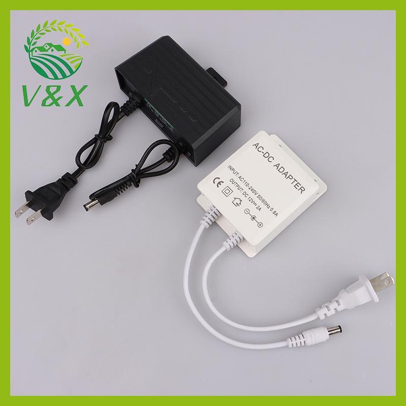 [Snowth] AC/DC 12V 2A 2000ma กล้องวงจรปิดแหล่งจ่ายไฟ adaptor กันน้ํากลางแจ้ง EU US Plug Adapter Charger สําหรับกล้องวงจรปิดกล้องวิดีโอ [zkm]