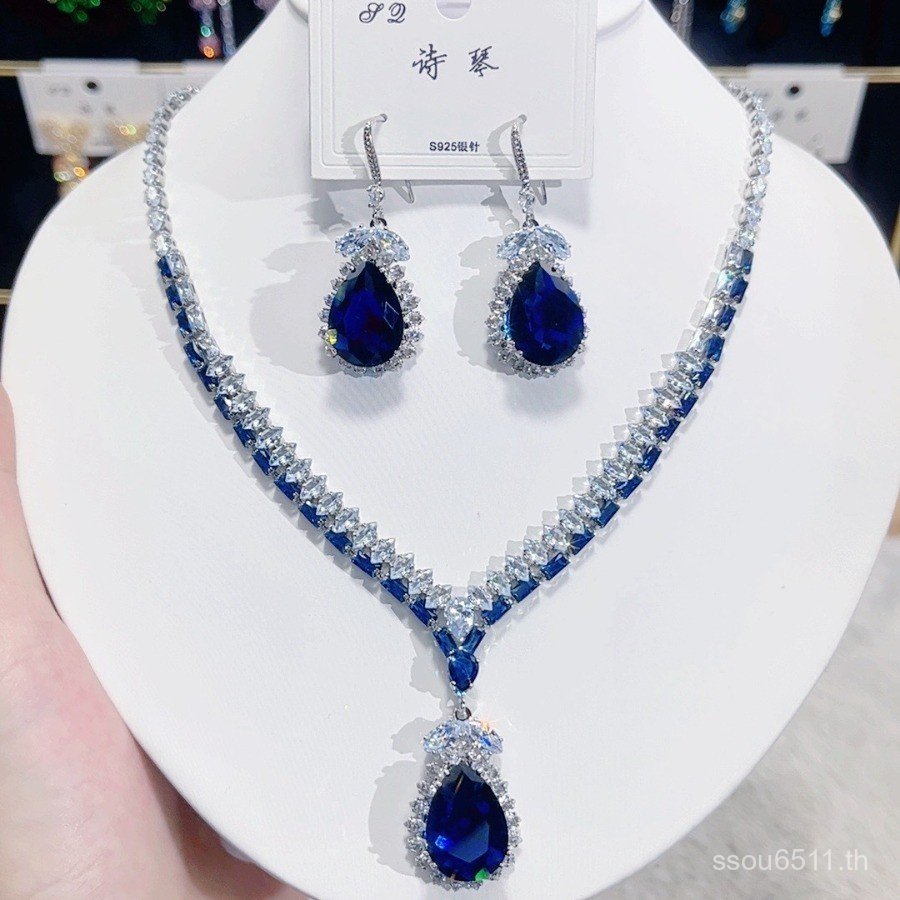 สร้อยคอหยดน้ําเซอร์โคเนียมอินหินระเบิดต่างหูสีฟ้าสดแฟชั่นสวมใส่กระโปรงชุดสูทหรูหรา JV61