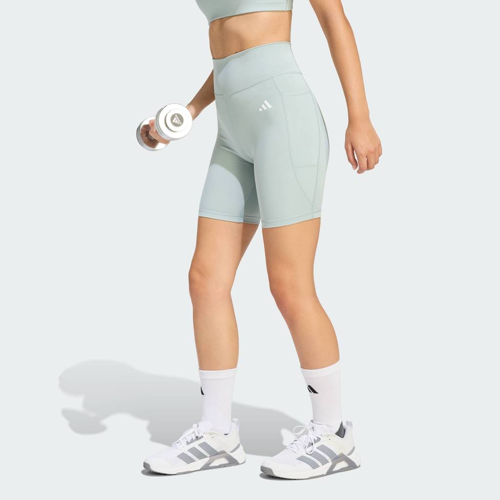 adidas Gym & Training & Yoga กางเกงรัดรูปขาสั้น 7 นิ้วมีกระเป๋า Optimé Essentials ผู้หญิง สีเขียว JZ0829