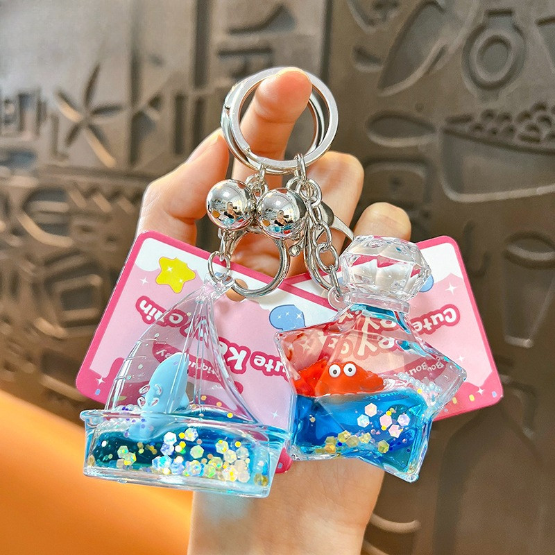 Creative Sea สัตว์น้ํามัน Drift ขวดพวงกุญแจน่ารักอะคริลิค Liquid Glitter พวงกุญแจรถจี้กระเป๋านักเรียนจี้ของขวัญวันหยุด