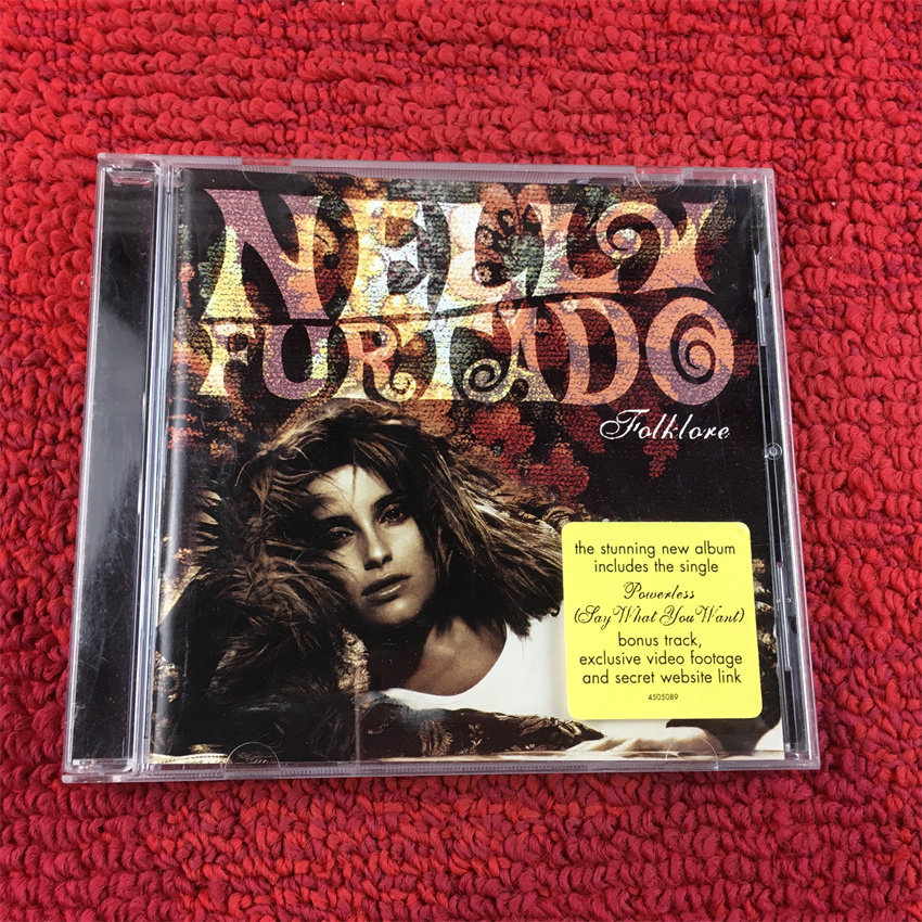 Nelly Furtado Folklore (Unsealing ) ซีดีและหน้ากระดาษเป็นแขวนอย่างดี1
