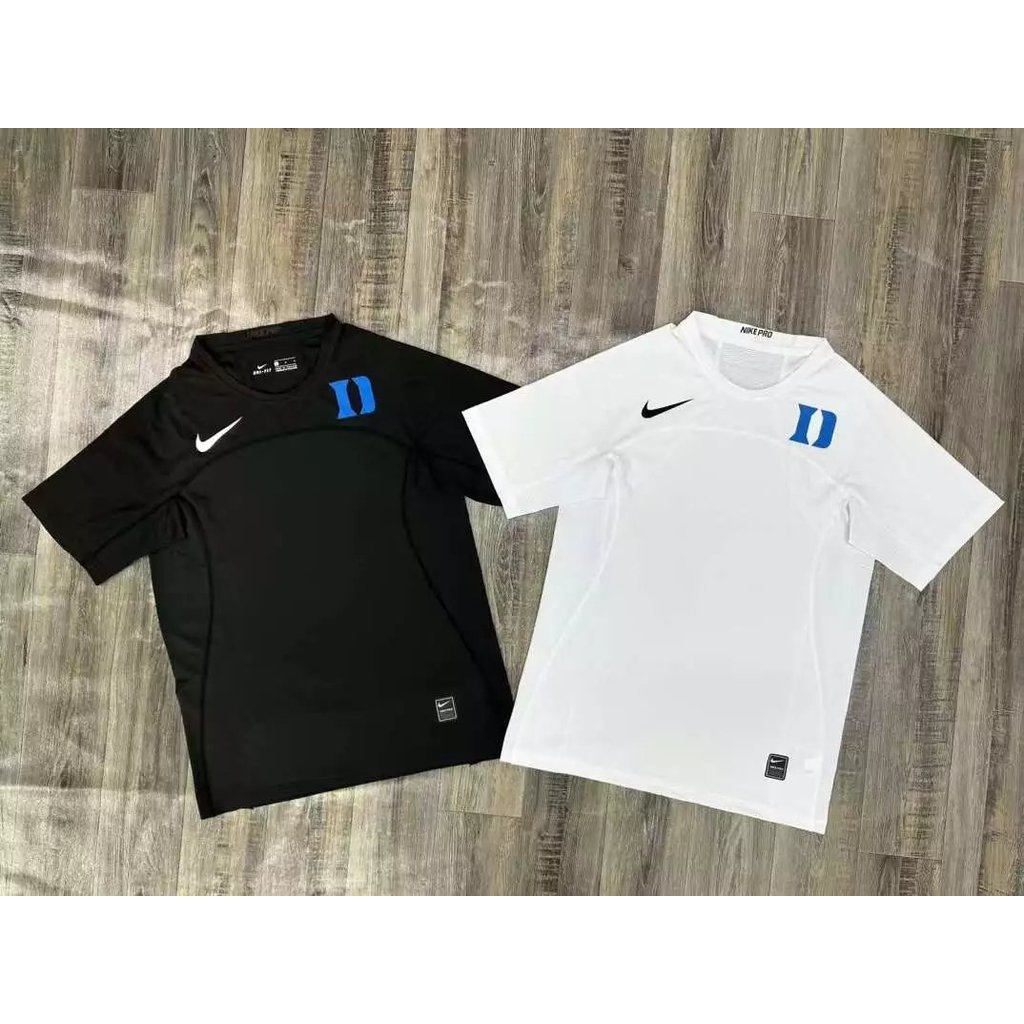 Nike nike NCAA Duke University Tights เสื้อยืดแขนสั้นเสื้อผ้าออกกําลังกายผู้ชาย Quick-Drying เสื้อผ้