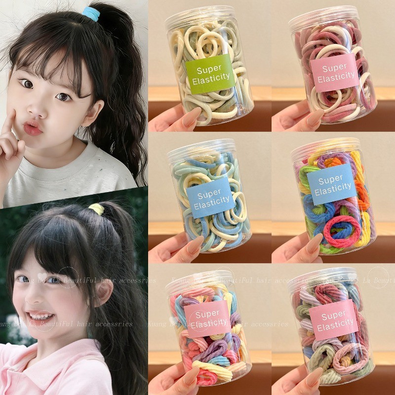 100 ชิ้นเด็กที่มีสีสันยางรัดเด็กลูกอมสีกระป๋องผ้าขนหนูแหวนยืดหยุ่นสูงไม่เสียหายสาว