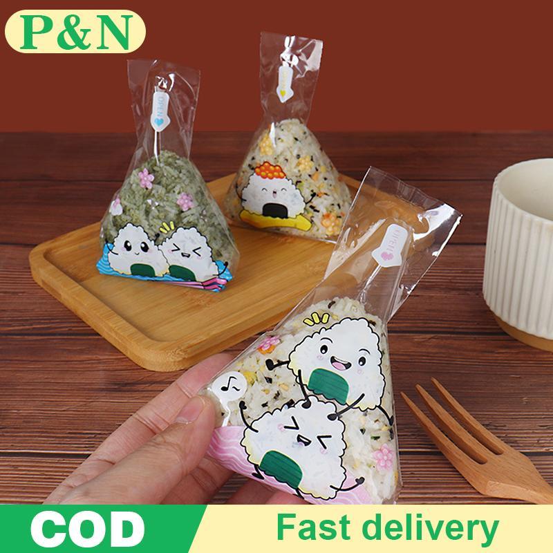 [P&N] 100 ชิ้นน่ารักการ์ตูนสามเหลี่ยมข้าวปั้น Paing กระเป๋าสาหร่ายทะเลซูชิ Mould กระเป๋าซูชิ Bento อุปกรณ์เสริมสาหร่ายทะเลข้าว Ball กระเป๋าซูชิ [cod]
