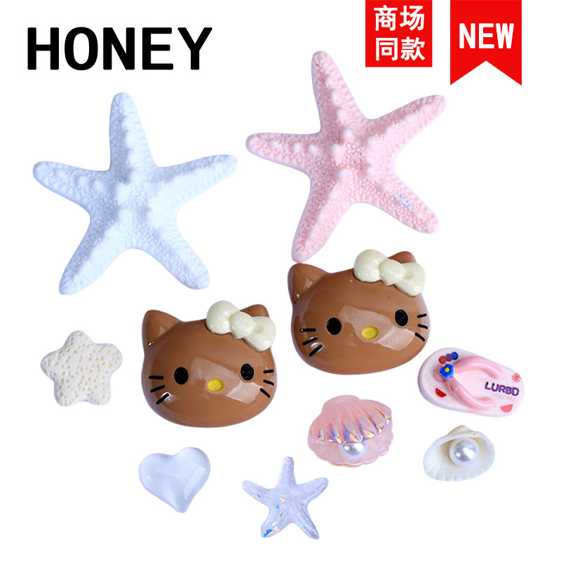 jibbitz crocs crybaby jibbitz crocs ของแทั ปลาดาวใหญ่สำหรับพวงมาลัยรองเท้า พร้อมการประดับด้วยดอกไม้ 