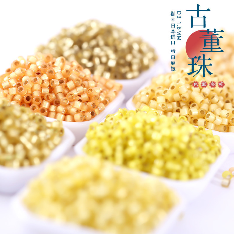 Yuxing DB ลูกปัดข้าวโบราณ 621/623/686/687/2171/2186/2187 โปรตีนที่เต็มไปด้วยเงินสีเขียว 1.6m