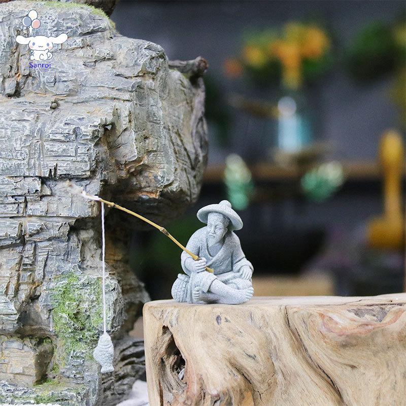 [San] 1 ชิ้น Aquarium Mini Fisherman รูปปั้นเอเชีย Zen ตกแต่งบ้านถังปลาสวนนั่งตกปลา Sandstone Vintage เครื่องประดับ POP