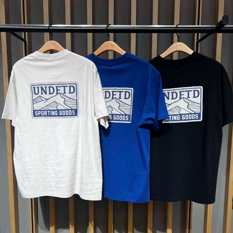 UNDEFEATED ฤดูใบไม้ผลิใหม่รูปแบบผลิตภัณฑ์พิมพ์ลูกเรือคออินเทรนด์เสื้อยืดแขนสั้น UC61GSS10M 058