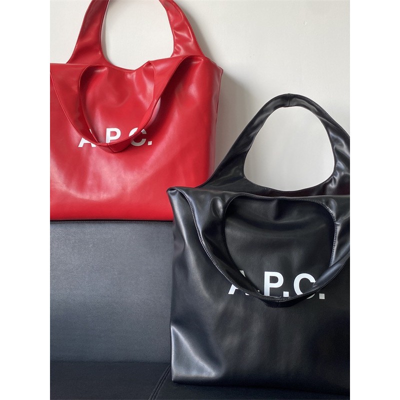 APC ผู้ชายผู้หญิง PU หนังกระเป๋าสะพายลําลอง Tote Bag กระเป๋าผ้าใบกระเป๋าช้อปปิ้ง