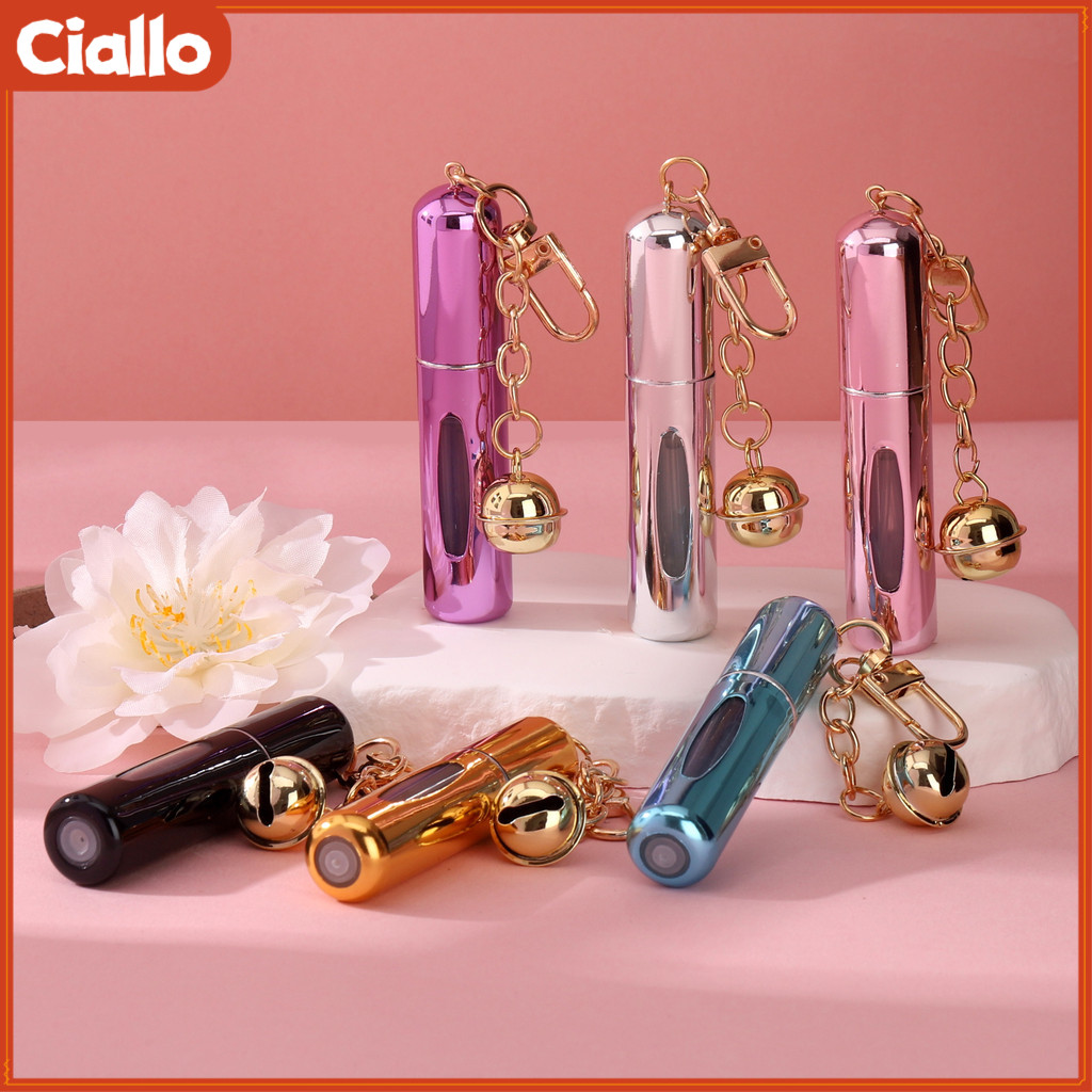 CIALLO พวงกุญแจเครื่องฉีดน้ําน้ําหอมแบบพกพา 5 มล. ขวดสเปรย์น้ําหอมรีฟิลพร้อมเสน่ห์ระฆังน่ารักที่ใส่น้ําหอมสําหรับเดินทางกันรั่วสําหรับกระเป๋าและกร
