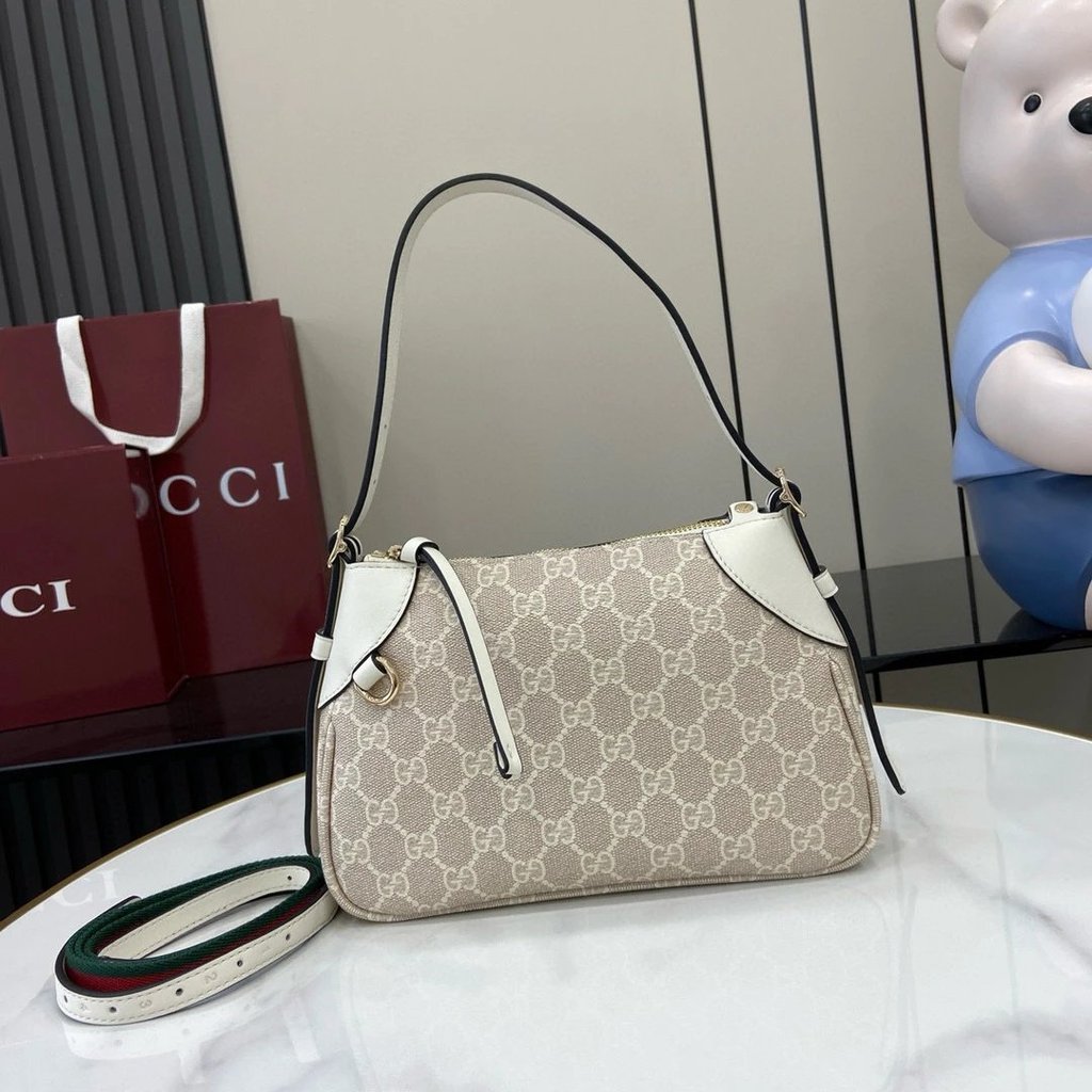 GUCCI/GUCCI Female Bag All-Match GG Emblem Series กระเป๋าสะพายขนาดเล็กกระเป๋าสะพาย Messenger กระเป๋า