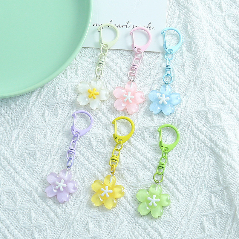 จําลองซากุระพวงกุญแจสีโปร่งใสดอกไม้จี้แฟชั่นเรซิ่นกระเป๋าโรแมนติกตกแต่งที่สําคัญเสน่ห์ของขวัญ