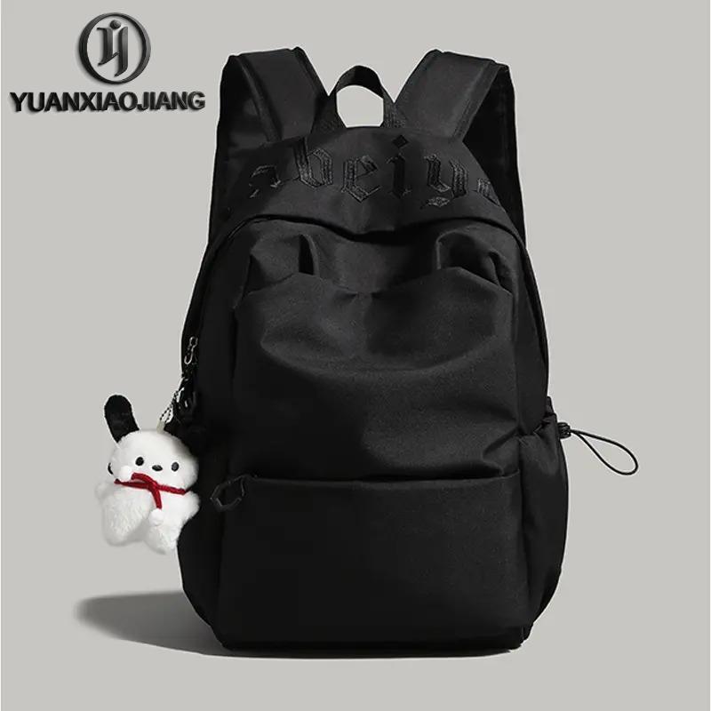 YUANXIAOJIANG กระเป๋าเป้สะพายหลังนักศึกษาจุเยอะใส่คอมได้ผ้ากันน้ำสไตล์Insรุ่นใหม่ปี2026