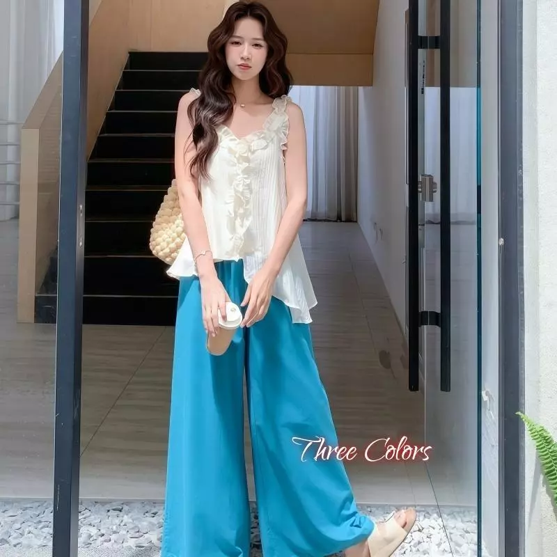 Dode.mall 99412#เสื้อแขนกุดคอวีระบายตัวนี้ดูดีมีสไตล์และน่ารัก เหมาะสำหรับฤดูร้อนปี 2026 มีดีไซน์คอวีสไตล์เกาหลี