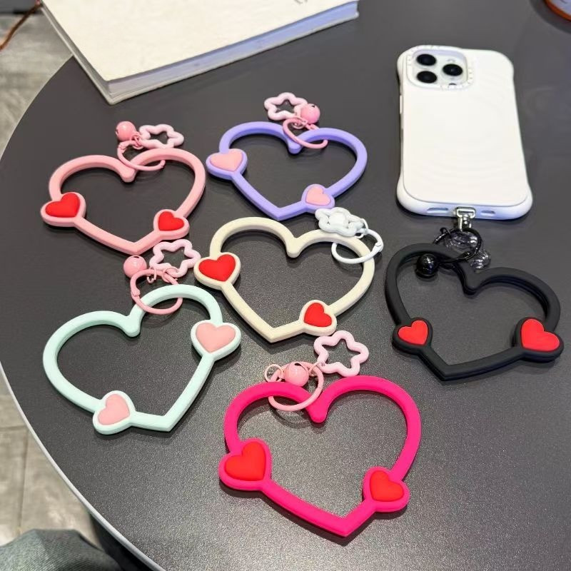 จี้โทรศัพท์มือถือสามารถจับคู่กับกรณีโทรศัพท์น่ารักซิลิโคนหัวใจใหญ่ป้องกันการสูญหายและป้องกันการตกสายรัดข้อมือแขวนตกแ