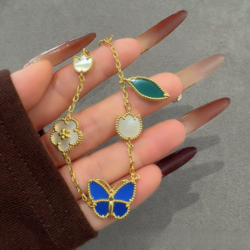 สร้อยข้อมือผีเสื้อสีฟ้าแฟชั่นโคลเวอร์สี่ใบแสงหรูหรายุ่งดอกไม้สร้อยข้อมือห้าดอกไม้ผู้หญิง