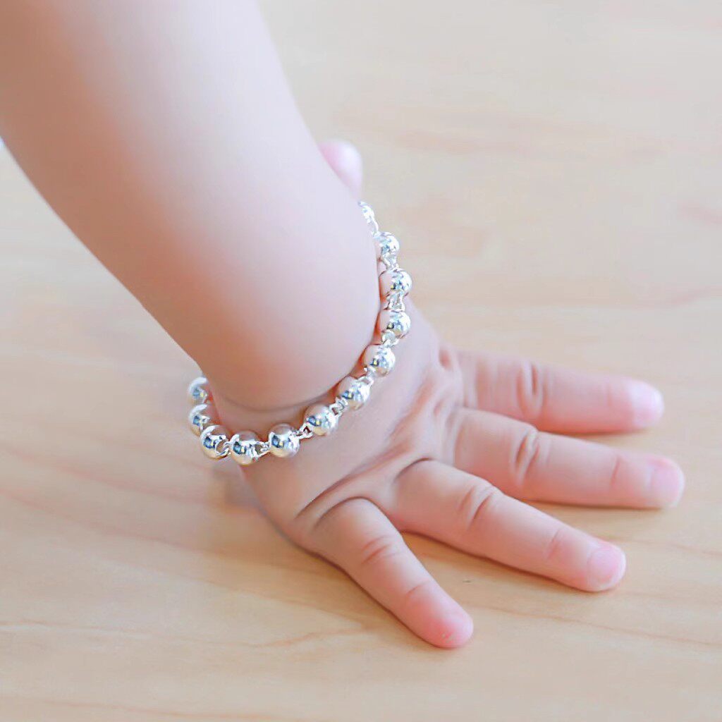 ลาว เฟิงเซียง เด็กสร้อยข้อมือเงินสาวเด็ก 999 ลูกปัดเด็กสาวเงินสเตอร์ลิงรอบลูกปัดหนึ่งปีพ่อแม่และลูกสร้อยข้อมือเงินแท้ ทําเอง