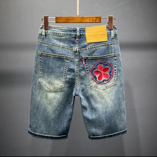 Koi กางเกงยีนส์ปักกางเกงขาสั้นผู้ชาย Ripped Middle-Aged Men Street Wear Stretch Slim-fit ปัก