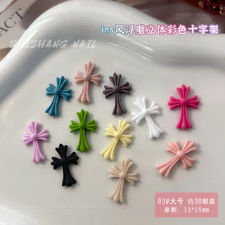 เครื่องประดับเล็กๆ ที่ทำจากเรซินสีสันสดใส แบบกางเขนโดพามีน