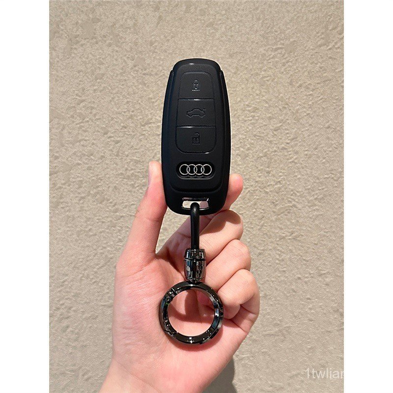 เหมาะสําหรับ Audi A4L ฝาครอบรถ A6L/Q5L/A3/Q3/A4/Q2L/Q7L ชาย A5/Q7/A8 เปลือกหัวเข็มขัด VQ5S