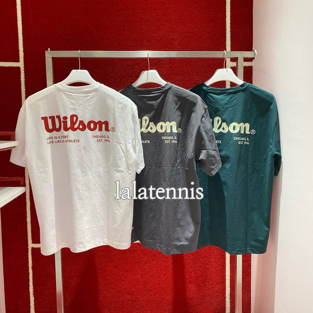 Wilson Classic Puredry Back โลโก้ขนาดใหญ่พิมพ์แขนสั้นหลวมผ้าฝ้าย 100% แฟชั่นเทนนิสกีฬาเสื้อยืด 058
