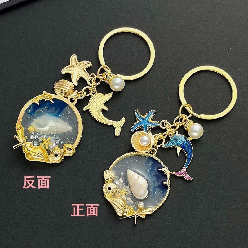 1创意简约贝壳海洋星辰美人鱼海星海豚钥匙扣海螺包扣小挂小礼品4.23Creative and Simple Shell Ocean Star Mermaid Starfish Dolphin Keyc