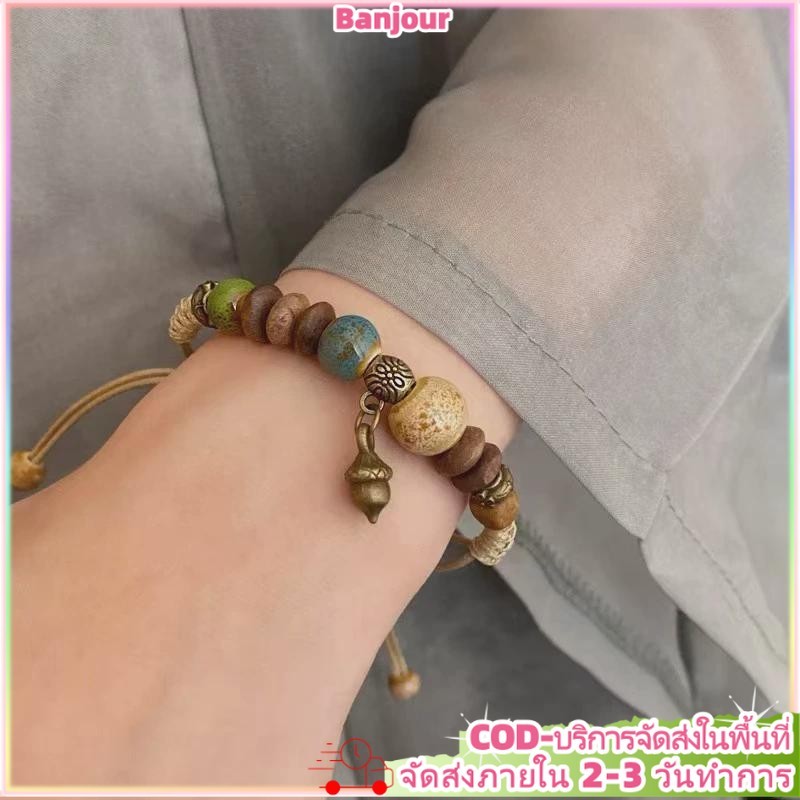 สไตล์ชาติพันธุ์เซรามิกโลหะผสมทอมือสุภาพสตรีสร้อยข้อมือปรับศิลปะซ้อนเครื่องประดับมือ