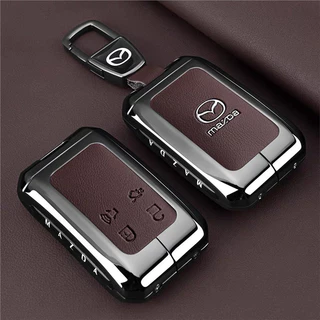 เหมาะสําหรับ 2026 Mazda 6e ฝาครอบกุญแจ 2026 Mazda 6e สไตล์ใหม่ 2026 mazda 6e กระเป๋ารถป้องกันกรณีหัวเข็มขัดหนัง