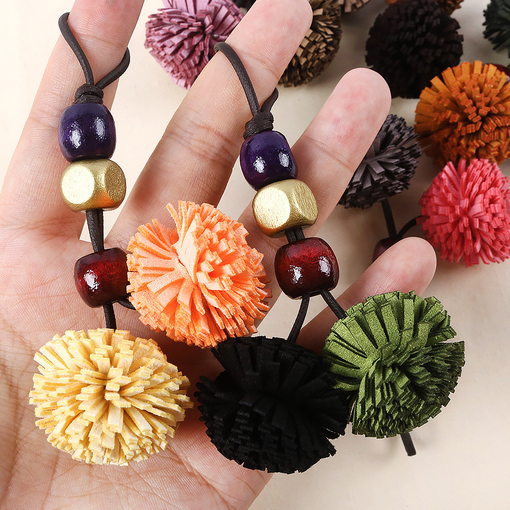 แฟชั่น Maillard ทอหนังพู่บอลลูกปัดไม้ DIY กระเป๋าจี้เครื่องประดับโทรศัพท์