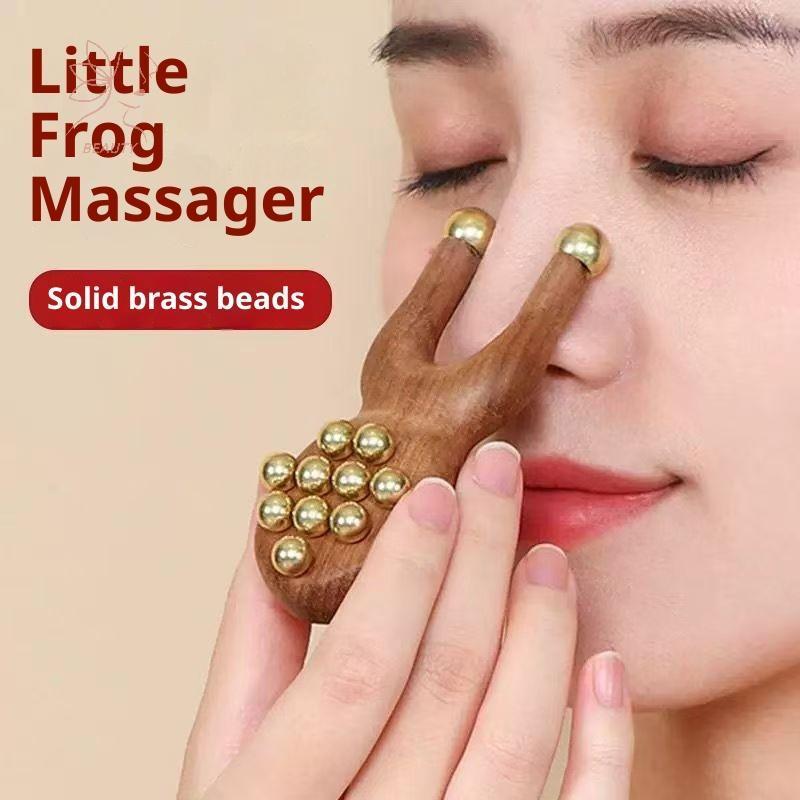 [maybeauty] 12ลูกปัดทองแดง Guasha เครื่องนวดหน้าเครื่องมือไม้จันทน์จับ Fascia ยกใบหน้าคู่มือนวด Anti Static กบรูปร่างมือถือสําหรับใบหน้าจมูกตา {TH}