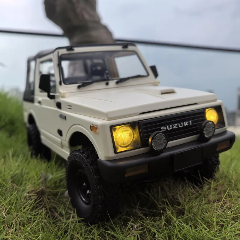 2025 สไตล์ใหม่ Naughty Dragon C74-1 1/10 Full Scale Jimny 4wd ปีนเขาจําลองรีโมทคอนโทรลรถเปิด Top Edi