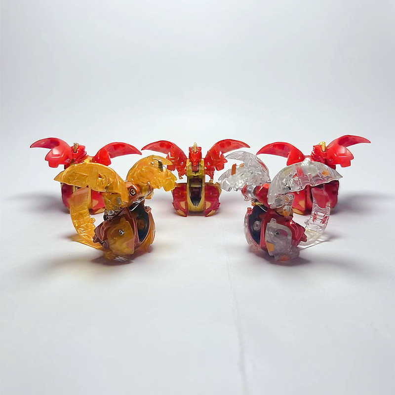 【พร้อมส่ง】ของแท้ bakugan bakugan bakugan Fire ชุดไดโนเสาร์ไข่ Ball Catapult เด็กการเปลี่ยนรูปของเล่น
