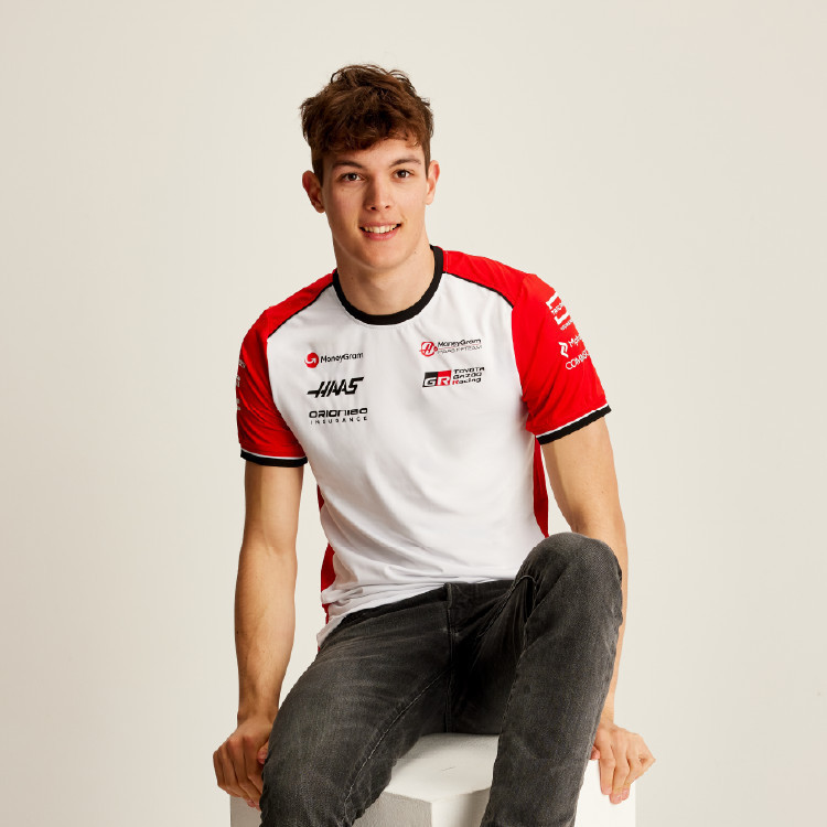 เสื้อยืดทีม Haas F1 ปี 2025 สำหรับผู้ชาย เสื้อยืดระบายอากาศได้แห้งไว ออกแบบมาเหมือนเสื้อยืดแขนสั้นแบบแจ็คเก็ตแข่งขัน