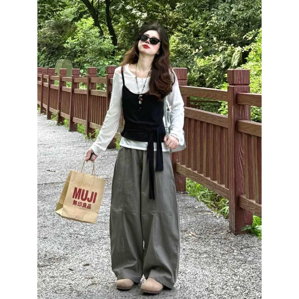 Cherry พร้อมส่ง☔️🧸เสื้อยืแขนยาวผู้หญิง เสื้อ2ชิ้นติดกับ ดีไซน์โปว์ผูกเอวเสื้อครอปทรงเข้ารูปสีดำคอกลม ลำลอง แฟชั่นผู้หญิ - รูปที่ 2