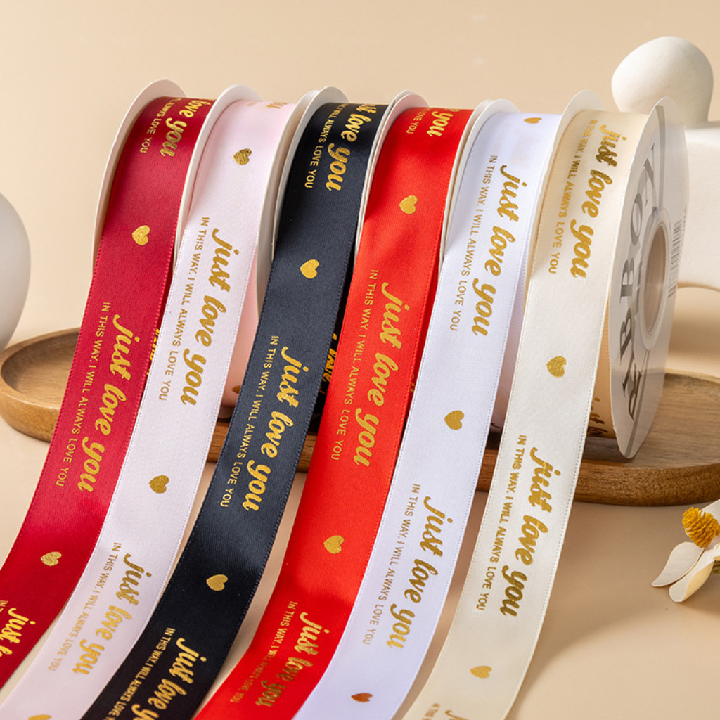 ริบบิ้นผ้าซาตินปั๊มทอง พิมพ์คำว่า 