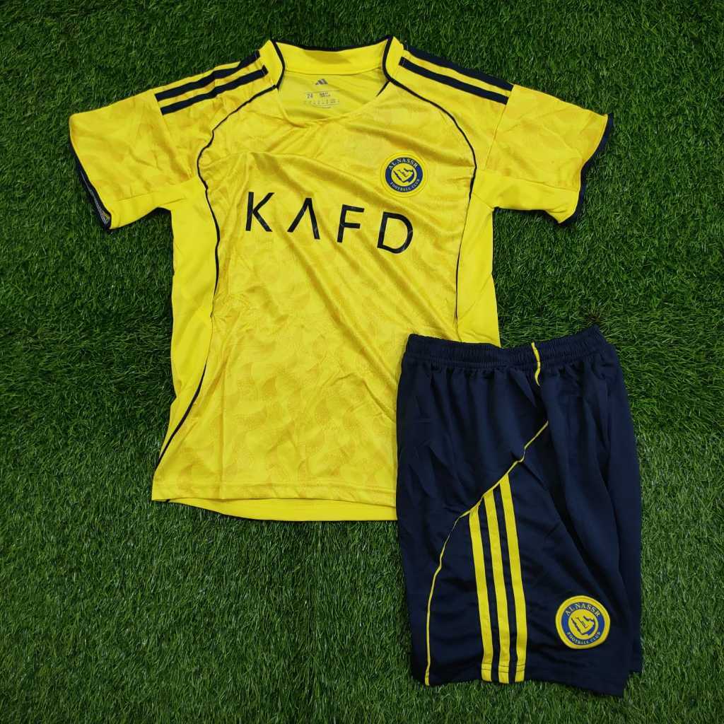 AL-NASSR HOME NEW 2025/2026 GRADE เสื้อฟุตบอลคุณภาพสูงดั้งเดิม - เสื้อฟุตบอลเด็ก