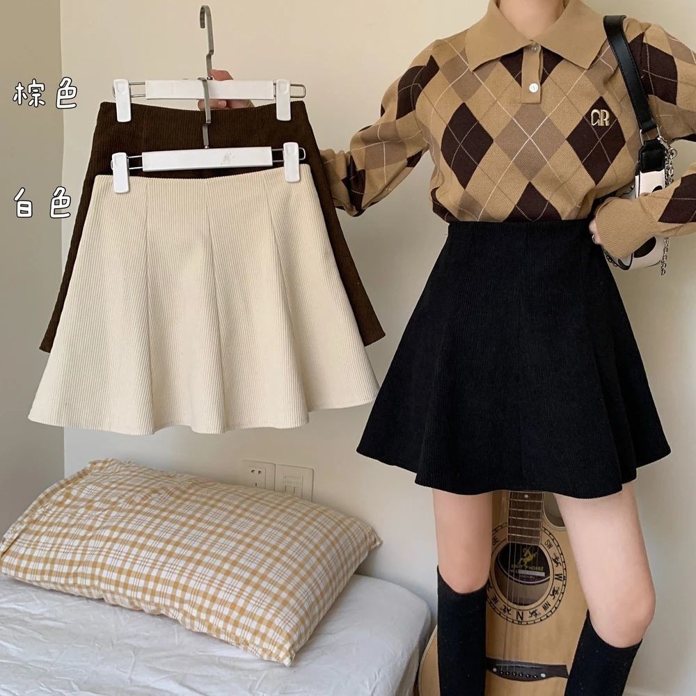 2026 กระโปรง A-LINE ผู้หญิง ทรงเอวสูง วัสดุ Retro corduroy ที่ทำให้ดูกายเพรียวและพรางสะโพกได้เป็นอย่างดี