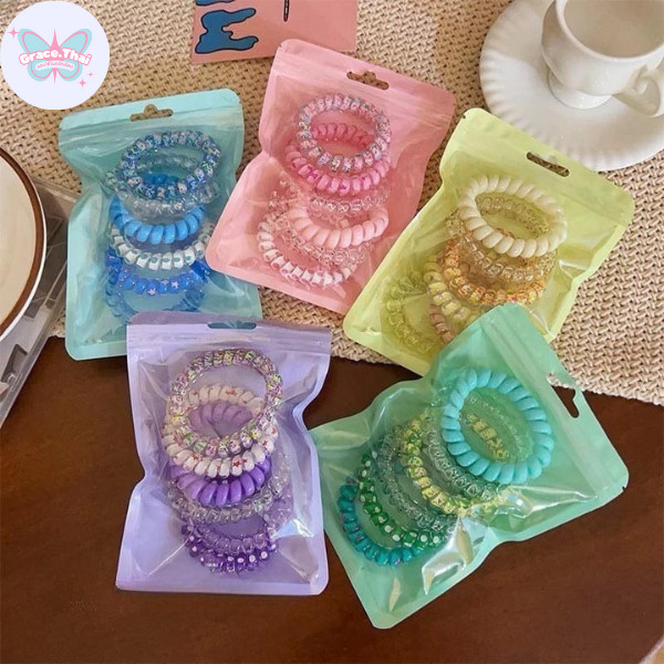 Grace Thai   ยางรัดผม หนังยางแบบเกลียว 6 ชิ้น มี 4 สี สีพาสเทลไล่ระดับสี มีลวดลาย ไม่ยืดง่าย ไม่หด ไม่ย้วย ไม่กินเส้นผม