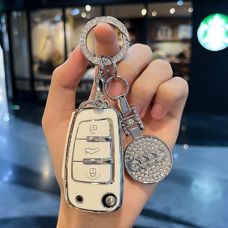 เหมาะสําหรับ Audi A6L ฝาครอบ a4l แบบเก่า q5l รถ a5 หัวเข็มขัด a7 ป้องกัน a8 เปลือก q7 แพ็ค q2l หญิง 