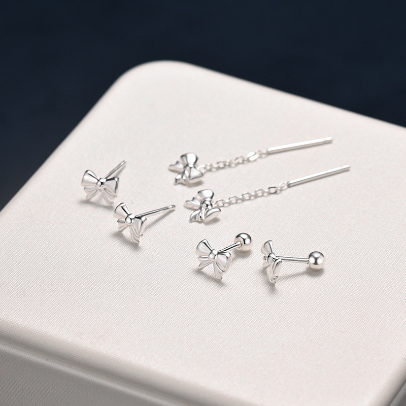 S999 เงินแฟชั่น All-Match ต่างหูโบว์หญิงหวานอ่อนโยนขนาดเล็ก Niche Design C01827 WO3F